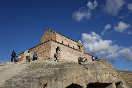 Gori , Georgia â 18 October,2021 : The main church with unique landscape Archaeological site of the Uplistsikhe cave town fortress on the sunny day â 18 October,2022 in Gori , Georgiaのeditorial素材