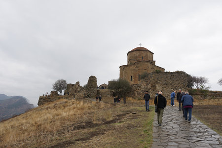 Mtskheta, Georgia â€“ 15 October,2021 : Tourist walking around the old building of  Jvari...