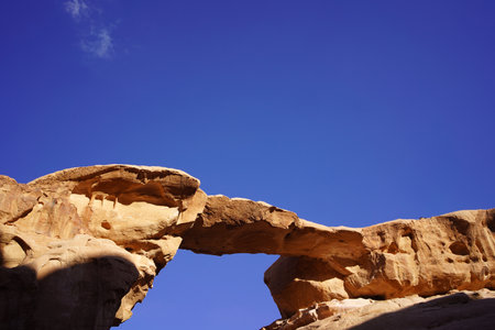 Natural stone structure of Burdah bridge in the desert of Wadi Rum , Jordanの写真素材