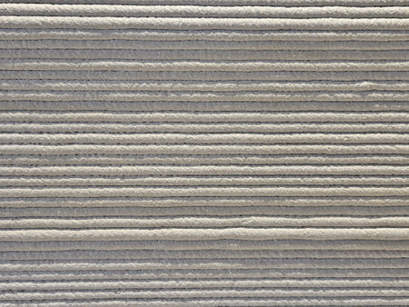 Closed up of the 3d printing in concrete material in horizontal line detail and textureの写真素材
