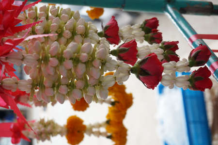 Thai floral round With Various Flowers, jasmines roses and crown flowers . The Sacred Garland made for deities Buddha or god.の写真素材