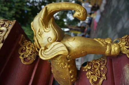 Golden Elephant statuette; A beautiful golden elephant statuette at Doi-Wao Temple, Thailand.の写真素材