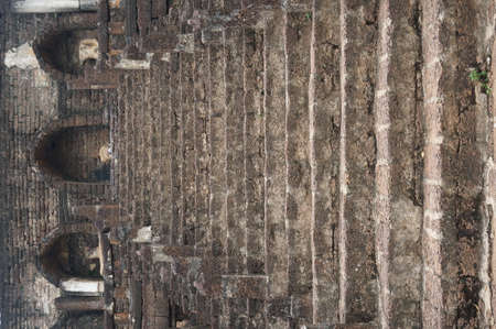 Ruin of stone stairs and collapse Buddha statues, Thailandの写真素材