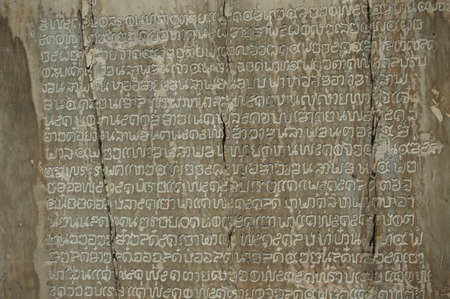 Closeup of Thai ancient stone inscription at Sukhothai province .のeditorial素材