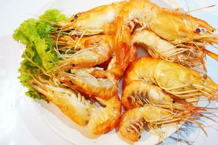 Grilled giant river prawns on white backgroundの写真素材
