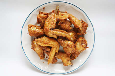 Chicken fritters on white plate isolated on white backgroundの写真素材