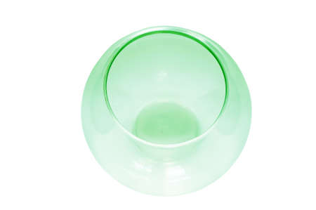 Empty fish bowl, glass bowl, green color,  isolated on white background, close upの写真素材