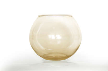 Empty fish bowl, glass bowl, orange color, isolated on white background, close upの写真素材