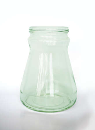 Empty green glass bottle isolated on white backgroundの写真素材