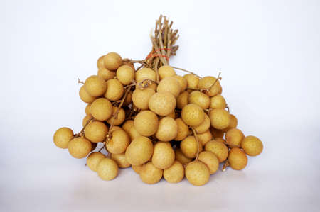 Close up of photo of very fresh longan fruits ( Dimocarpus longan ) isolated on white backgroundの写真素材
