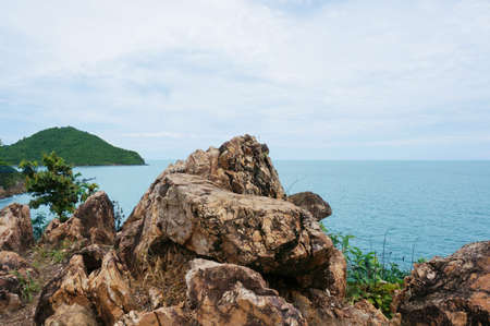 The rocky coast of the sea at Chao Lao Beach, Chanthaburi, Thailand                               の写真素材