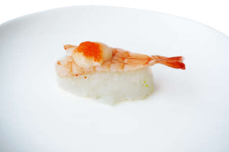 Asia - Asian eating food, Japanese food, photo of sushi shrimp and flying fish roe on mayonnaise isolated on white background, close up.の写真素材