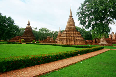 Ruin of the capital of the kingdom in the distant view, is a World Heritage at Sukhothai Historical Park, Sukhothai, Thailandの写真素材