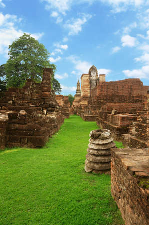 A photo of grass walkway at the the ruins of Sukhothai Historical Park, Thailand is a World Heritageの写真素材