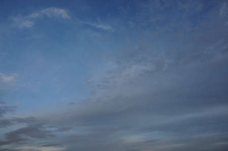 A photo of evening cloudy sky on sunsetの写真素材