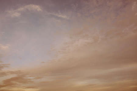 A photo of evening cloudy sky on sunsetの写真素材