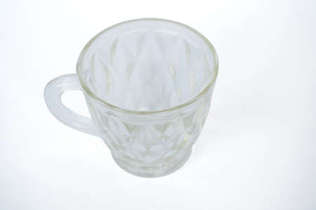 Crystal transparent utensils or crystal cup, glass cup, isolated on white background, close upの写真素材