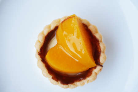 Fresh Homemade dessert mini persimmon Fruit Tart isolate on white backgroundの写真素材