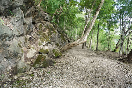 A photo of landscape of walkway in the mountain at Hellfire Pass: this walkway has used since World War II. Its destination is the abandon railway built by Allied prisoner at Kanchanaburi, Thailandの写真素材