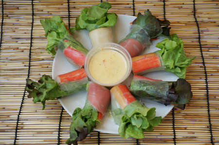 Clean food - fresh Spring Roll Salad or Salad Roll on rattan curtain background, close upの写真素材