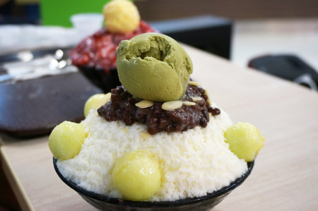 Asia-Asian food, Bing su: Korean shaved ice dessert with sweet toppings, melon, red bean and green...