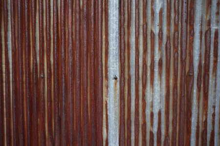 A photo of rusty Galvanize Sheet Abstract texture and background, close upの写真素材