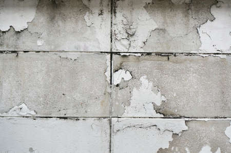 Old peeling paint on wall texture and background, Pattern of rustic antique grunge material.の写真素材