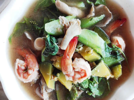 Asia-Asian eating food, Thaifood, Kang Liang Goong Sod: Thai Spicy Mixed Vegetable Soup with Prawns, close upの写真素材