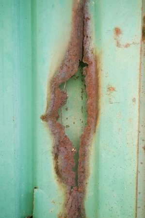 A photo of rusty Galvanize Sheet Abstract texture and background, close upの写真素材