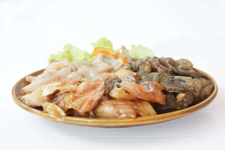 Raw foods: Fresh squid, white leg shrimp or pacific white shrimp (Litopenaeus vannamei, formerly Penaeus vannamei) and fish with chinese cabbage isolated on white background, close upの写真素材