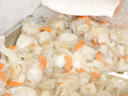 A photo of fresh Oyster on ice for sale in the fresh wet market, close upの写真素材