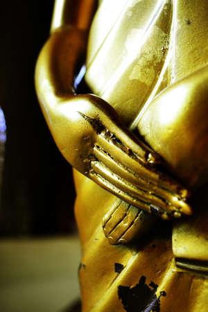 Beautiful golden hand of Buddha statue.の写真素材