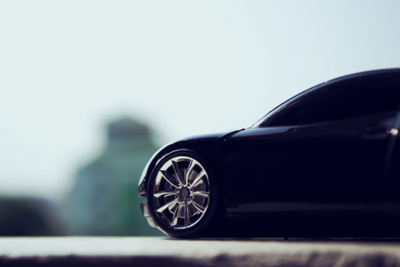 Black car  in retro concept with city sky 