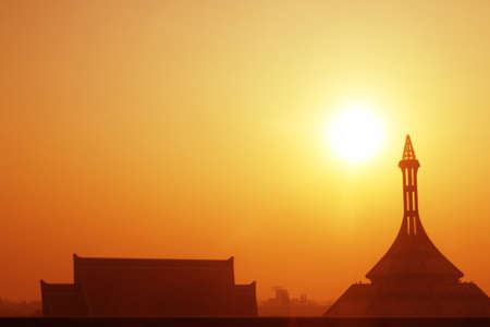 Tallest building in the city in sunset.の写真素材