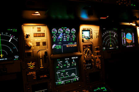 Light from a plane control  room in the dark.の写真素材