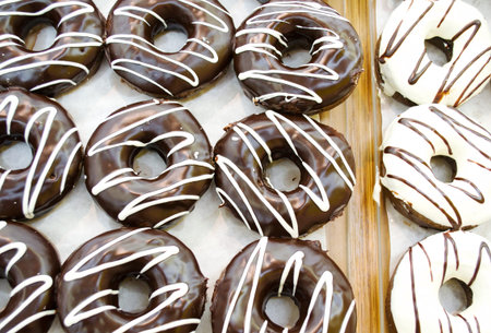 Chocolate donuts placed on the tray.の写真素材