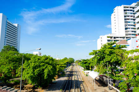 Railway station with tree and blue sky in the cityの写真素材
