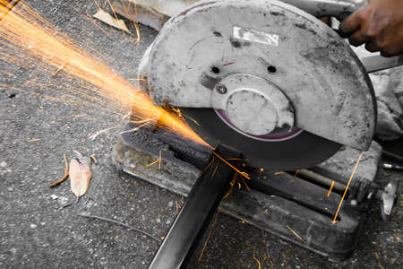 Machines for metal cutting with sparks lightの写真素材