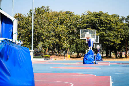 Outdoor basketball Stadium and sport light with blue skyの写真素材