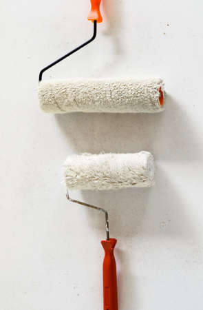 brushes and rollers for paint with blank wallの写真素材