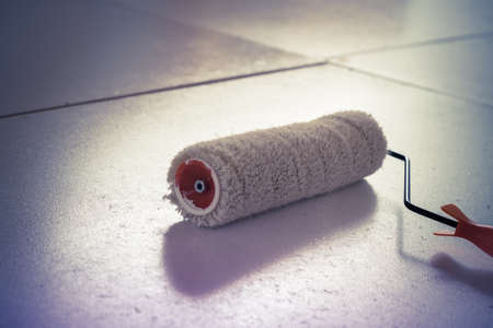 brushes and rollers for paint with blank wallの写真素材