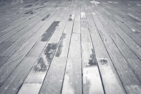 Wet wood floors with vintage color tone for texture and backgroundの写真素材