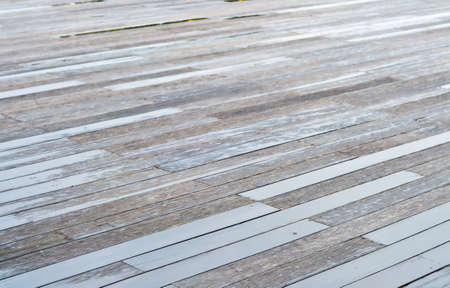 Wet wood floors with vintage color tone for texture and backgroundの写真素材