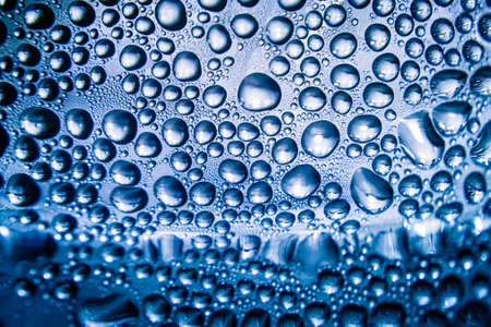 Texture of water drops on bottle for backgroundの写真素材