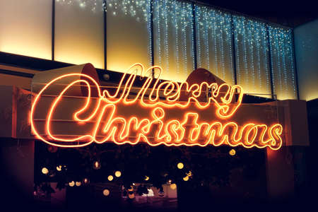 light bulb of christmas text at department store at day nightの写真素材