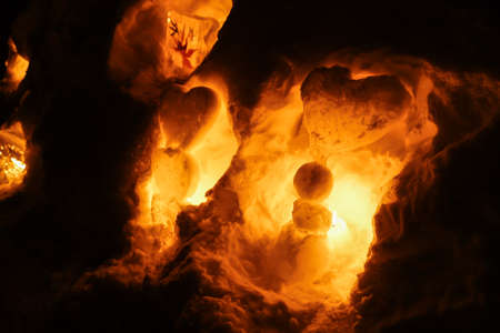 Night time with Candle light in ice and snow on Christmas dayの写真素材