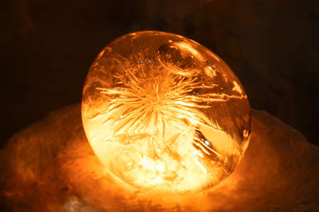 Night time with Candle light in ice and snow on Christmas dayの写真素材