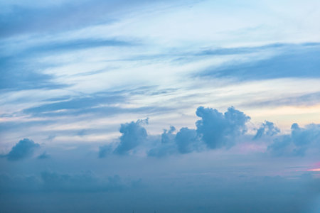 Colors and patterns of the clouds in the sky.