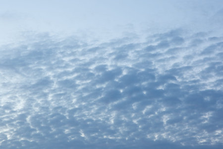 Colors and patterns of the clouds in the sky.