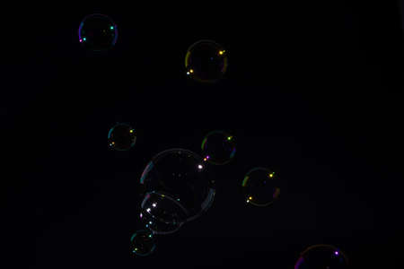 Background bubbles, black backgroundの写真素材